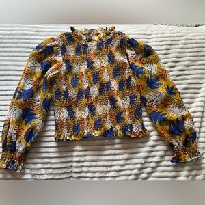 Yellow floral blouse with sheer sleeves